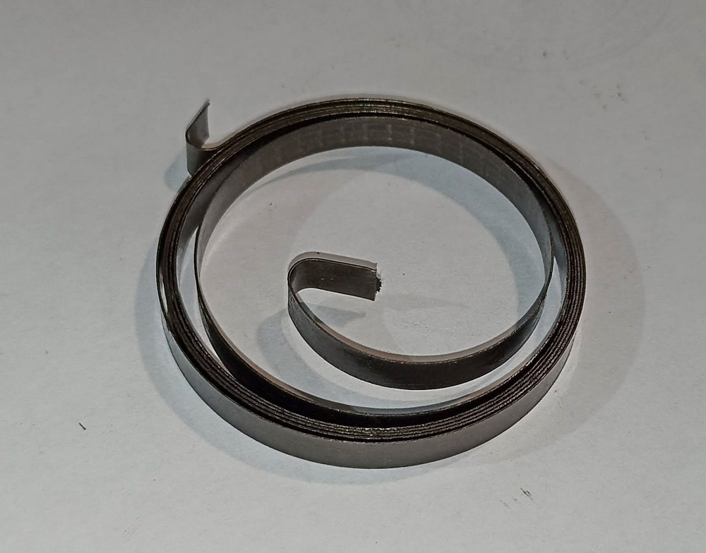 Пружина спиральная (ленточная) d-0,3 мм; H-5,0 мм; L-800 мм, D-45 мм (1 шт.)  #1